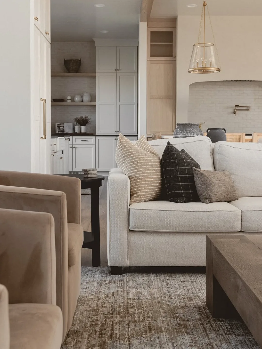 Living room seating area with styled pillows
